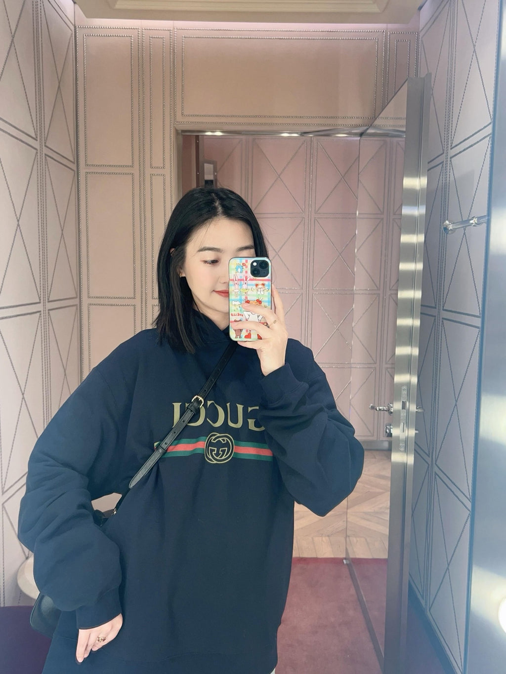 2026 Women's GU Printed Hooded Sweatshirt (DD177)