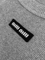 2026 Women’s MM Logo V-neck Top (FF718)